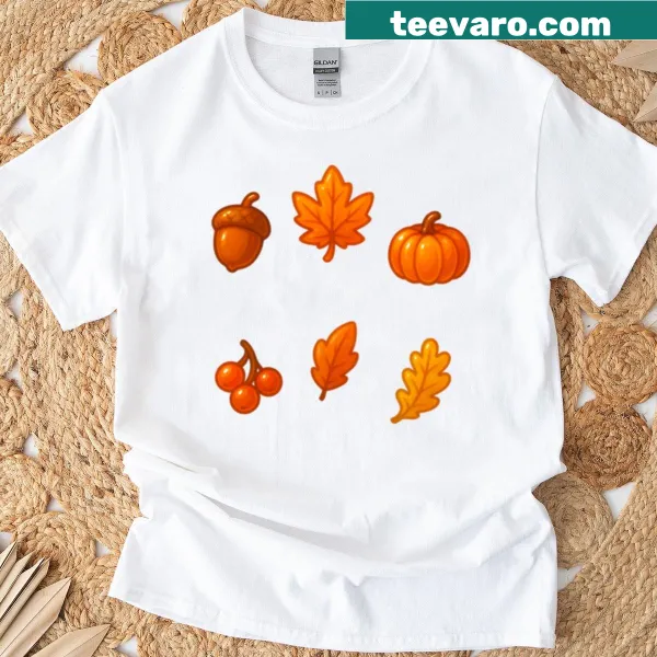T-shirt with adorable fall-themed graphics including pumpkins and leaves