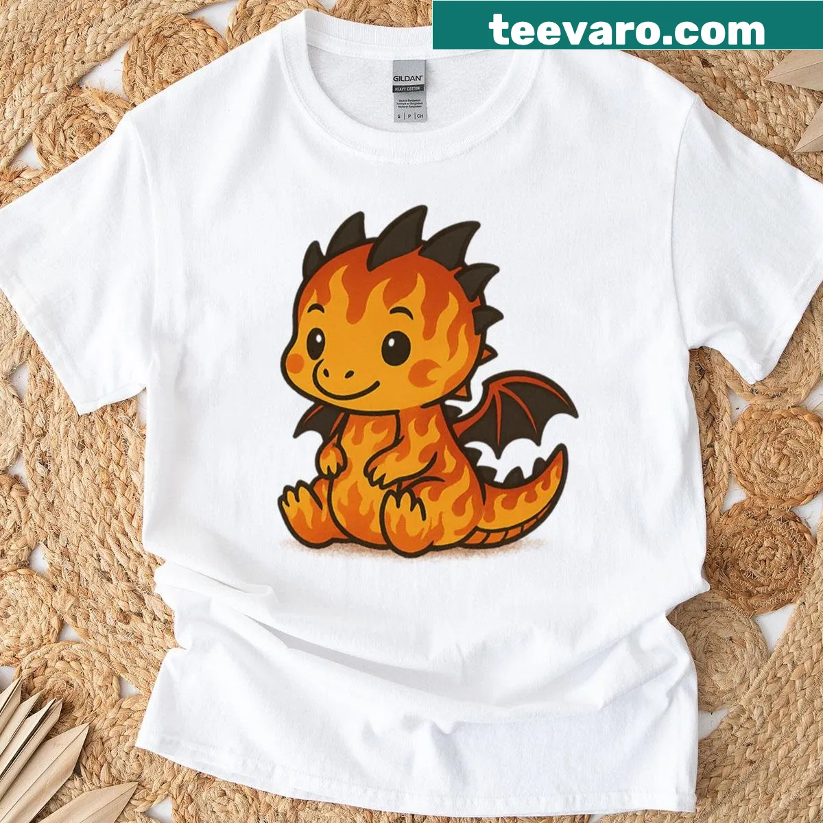 Kawaii baby dragon with flame pattern graphic on T-shirt — on a men's t-shirt