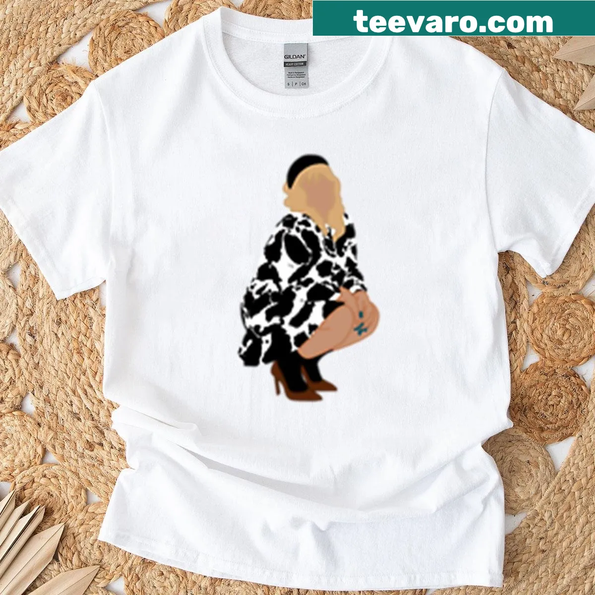 Brittany Broski T-shirt featuring cow print and fun graphic. — on a men's t-shirt