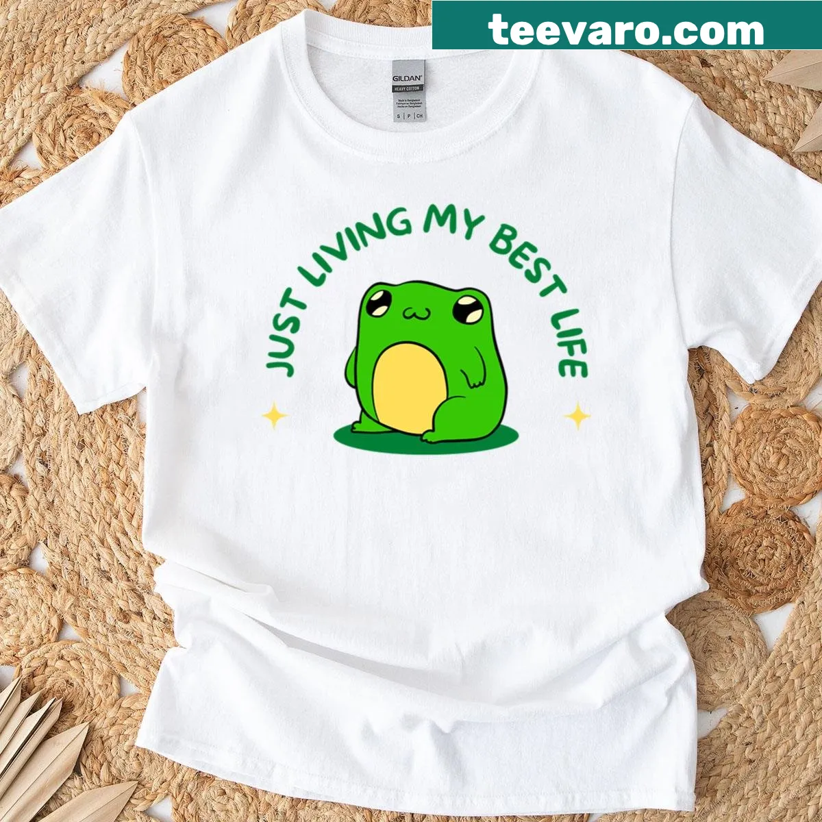 Oversized t-shirt with whimsical graphic of protesting frogs — on a men's t-shirt