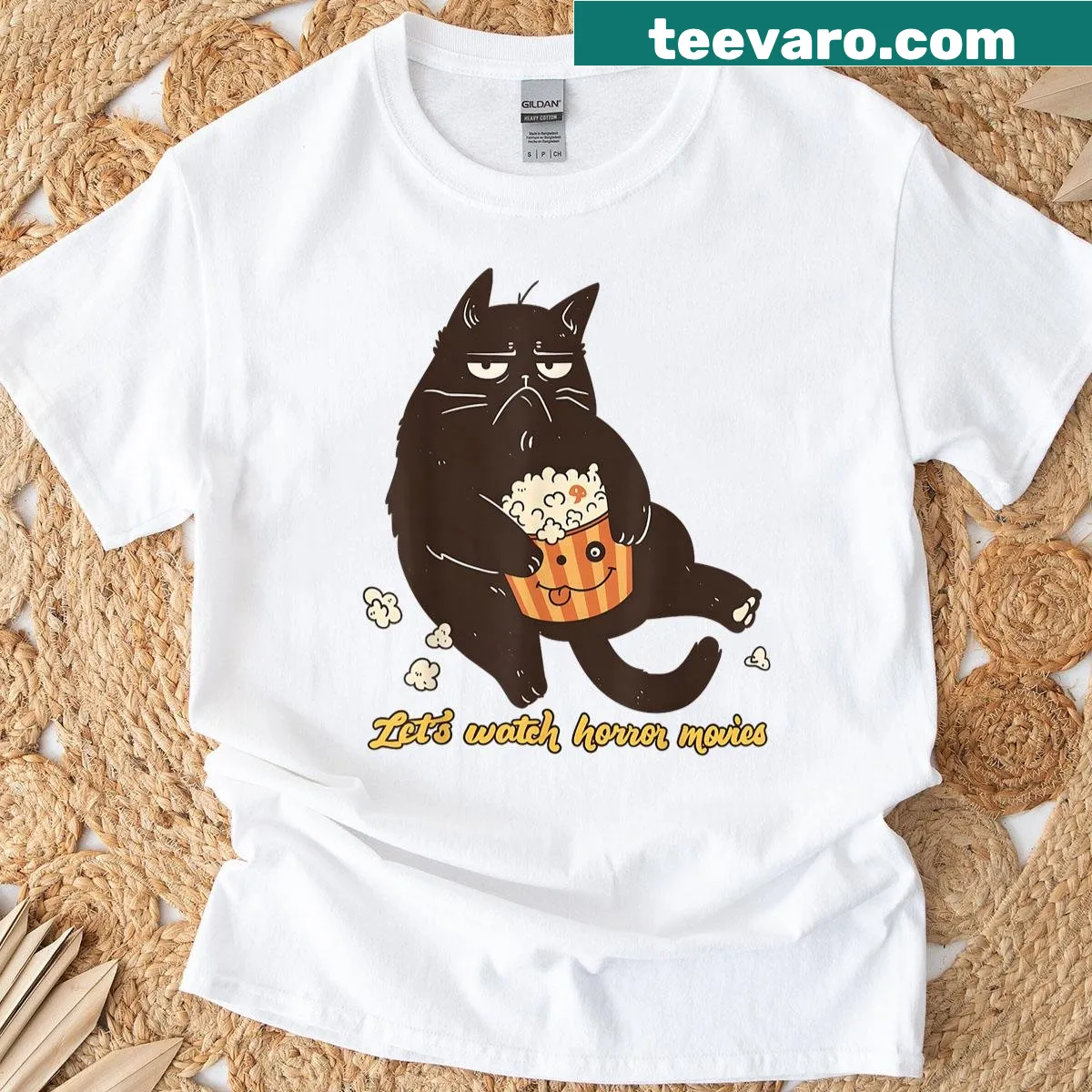 Halloween T-shirt with cat and horror movie theme — on a men's t-shirt