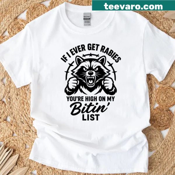 T-shirt featuring a funny raccoon graphic and humorous text about rabies