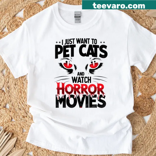 Halloween-themed T-shirt featuring a playful cat with horror elements