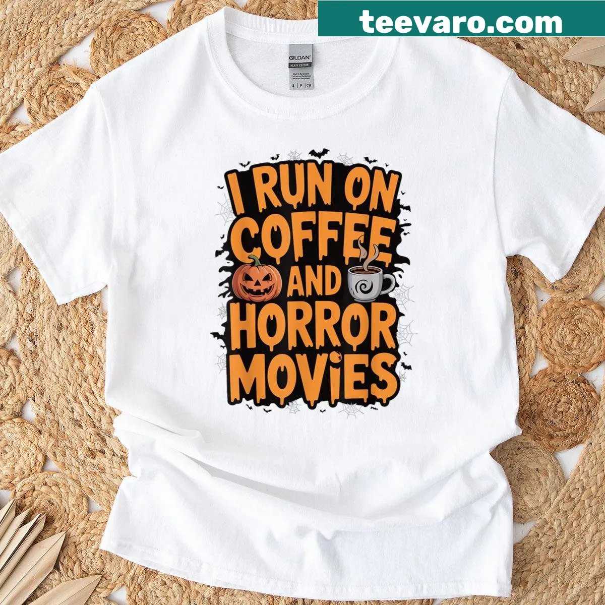 Text saying 'I Run On Coffee And Horror Movies' in bold typography — on a men's t-shirt