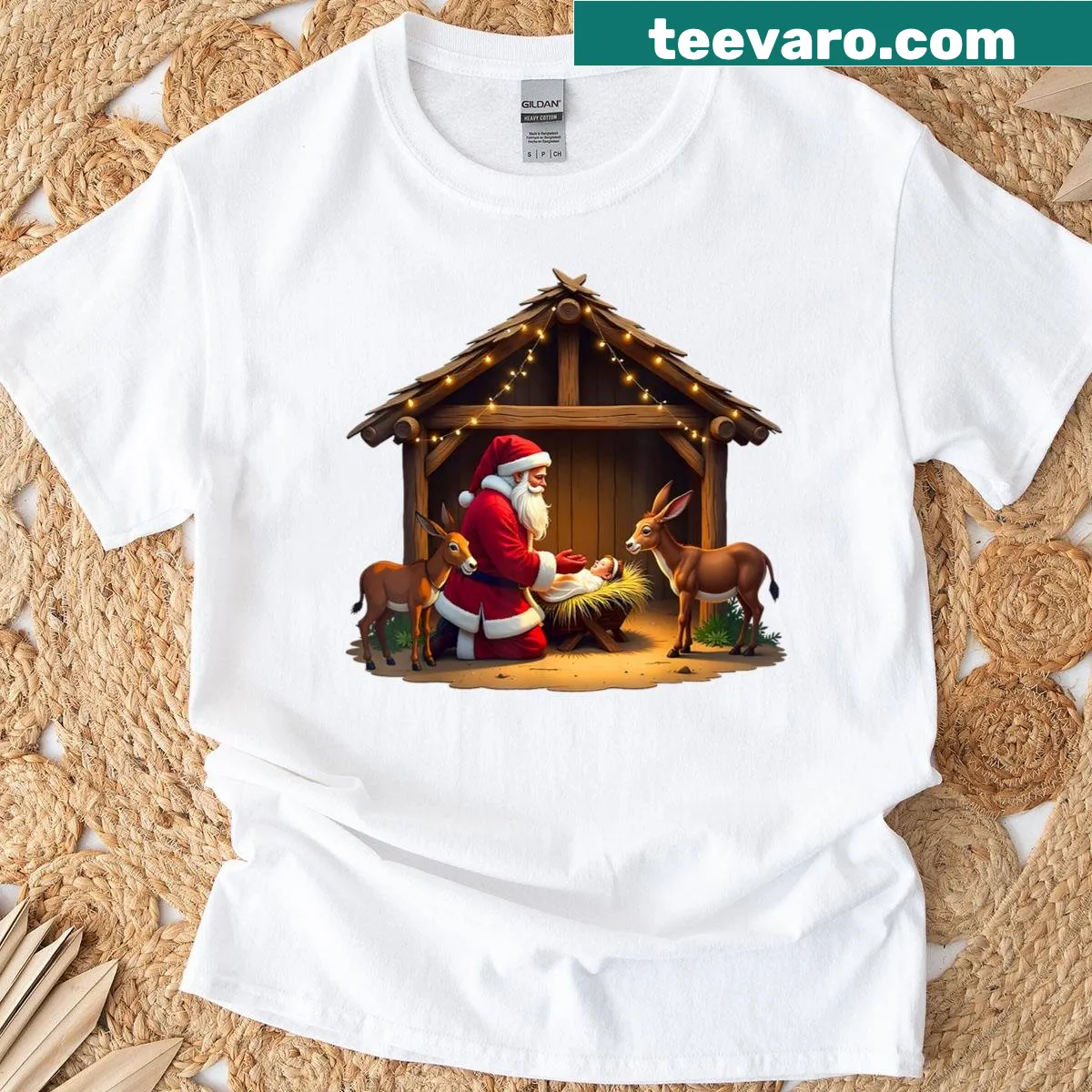 T-shirt featuring Santa Claus kneeling before Baby Jesus — on a men's t-shirt
