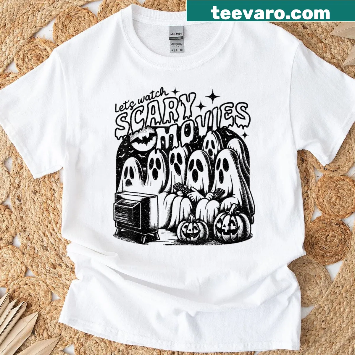 Halloween T-shirt with a ghost design and text about scary movies — on a men's t-shirt