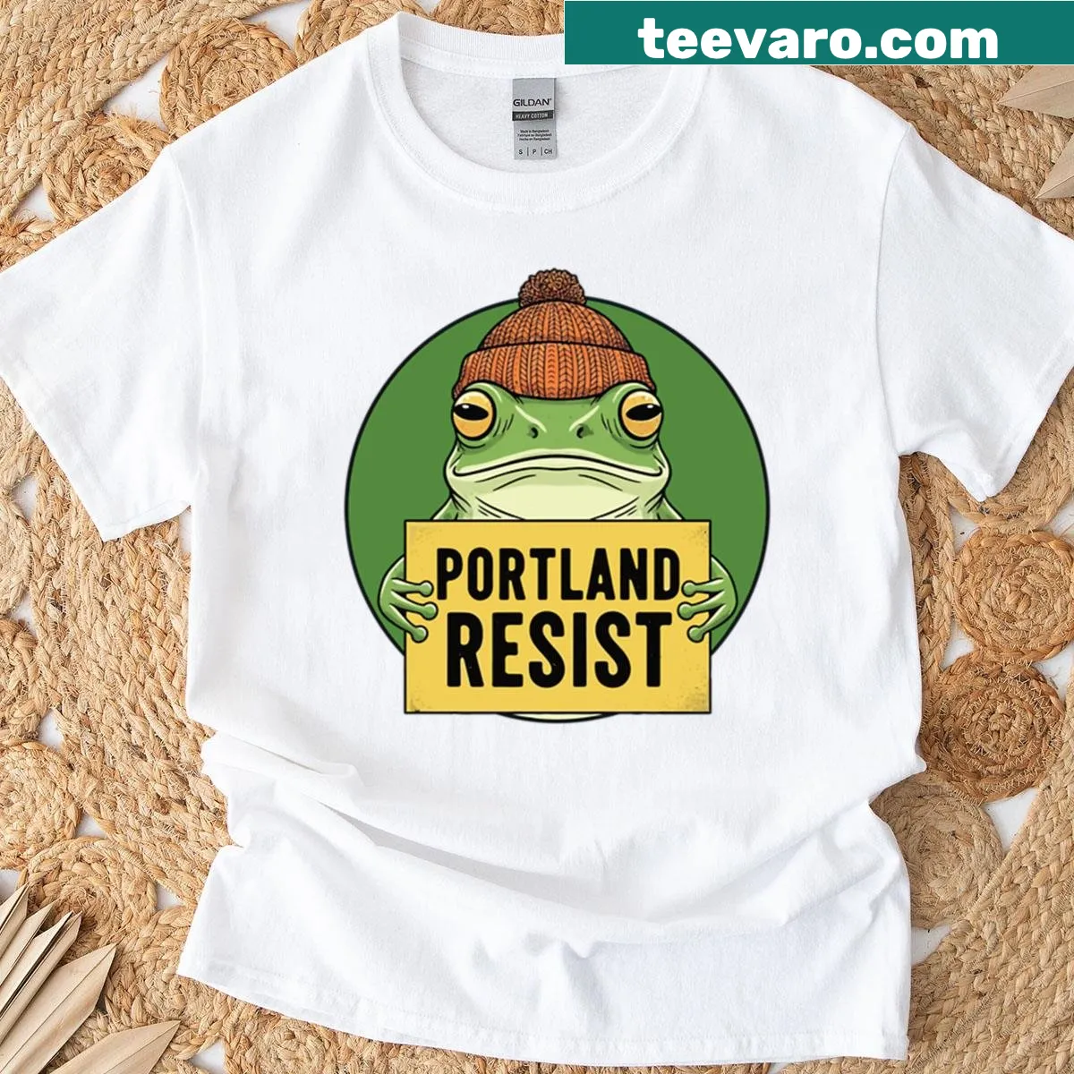 Bold illustration of a frog with a 'Resist' message on an oversized T-shirt — on a men's t-shirt