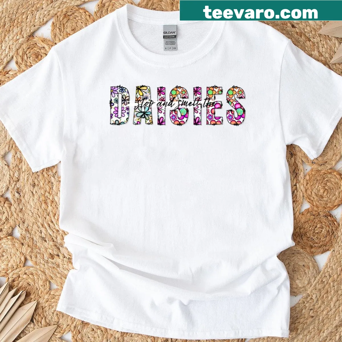 Floral-themed ladies T-shirt saying Stop And Smell The Daisies — on a men's t-shirt