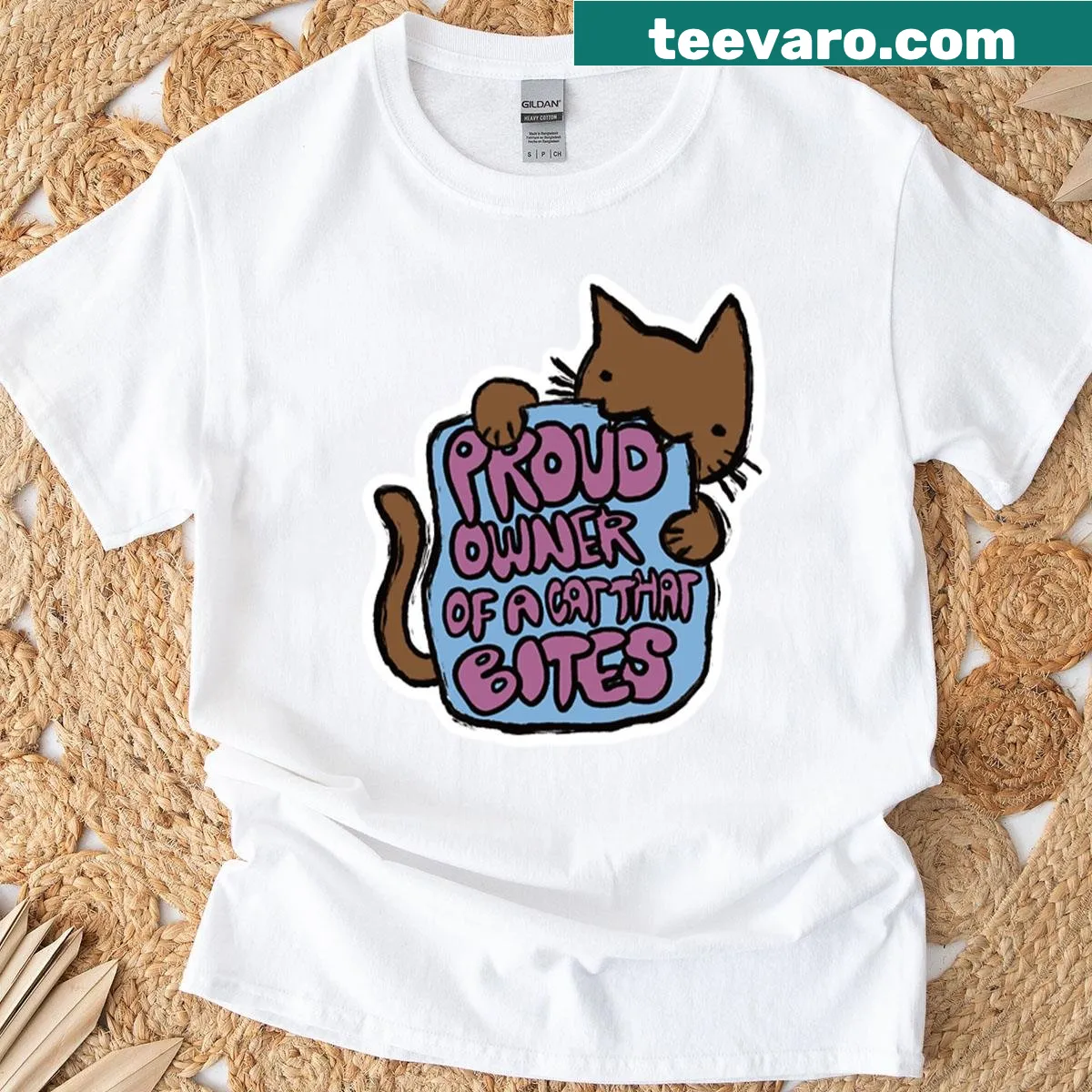 Playful design declaring pride in owning a biting cat — on a men's t-shirt