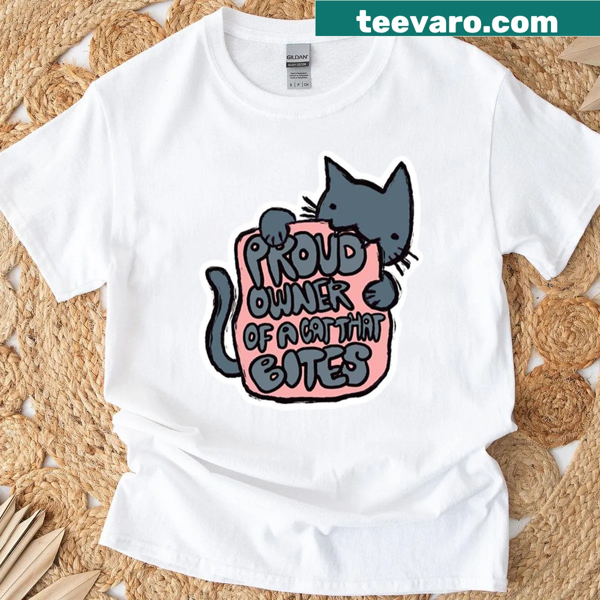 T-shirt with humorous cat ownership graphic — on a men's t-shirt