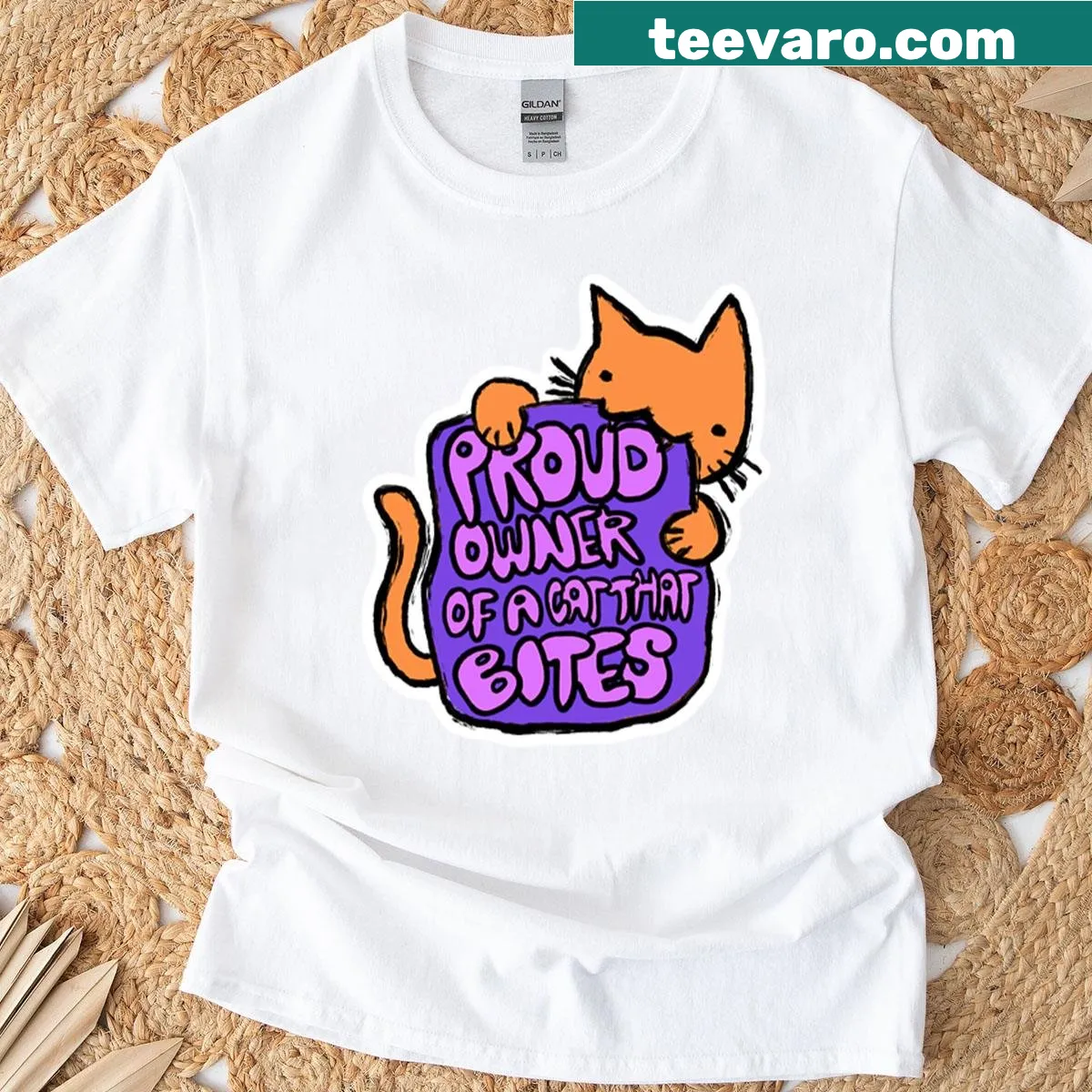T-shirt featuring a humorous cat ownership graphic — on a men's t-shirt