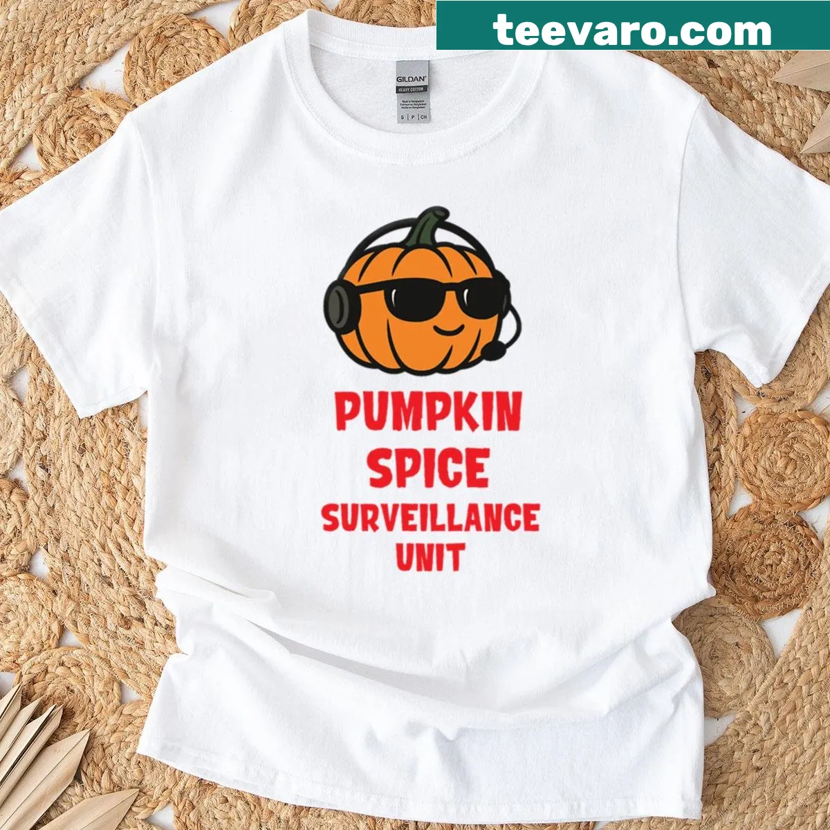Whimsical pumpkin spice surveillance unit illustration on t-shirt — on a men's t-shirt