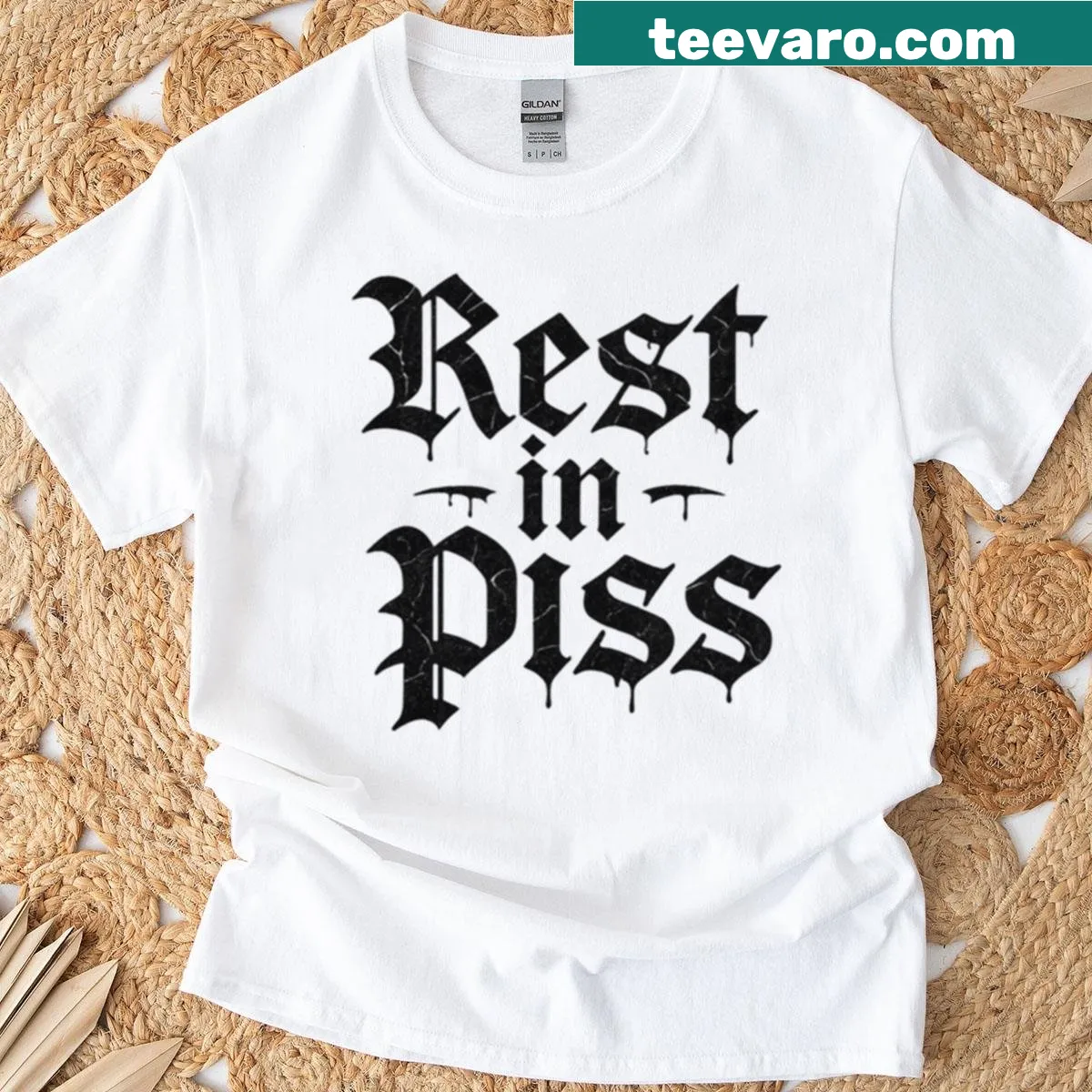Bold blackletter design featuring 'Rest In P' on an oversized T-shirt — on a men's t-shirt
