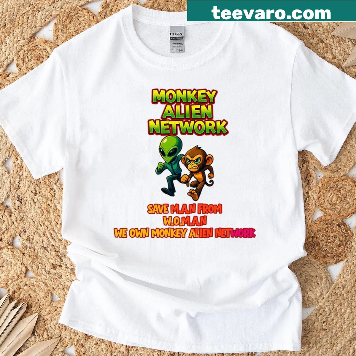 Oversized t-shirt with a surreal alien and monkey design — on a men's t-shirt