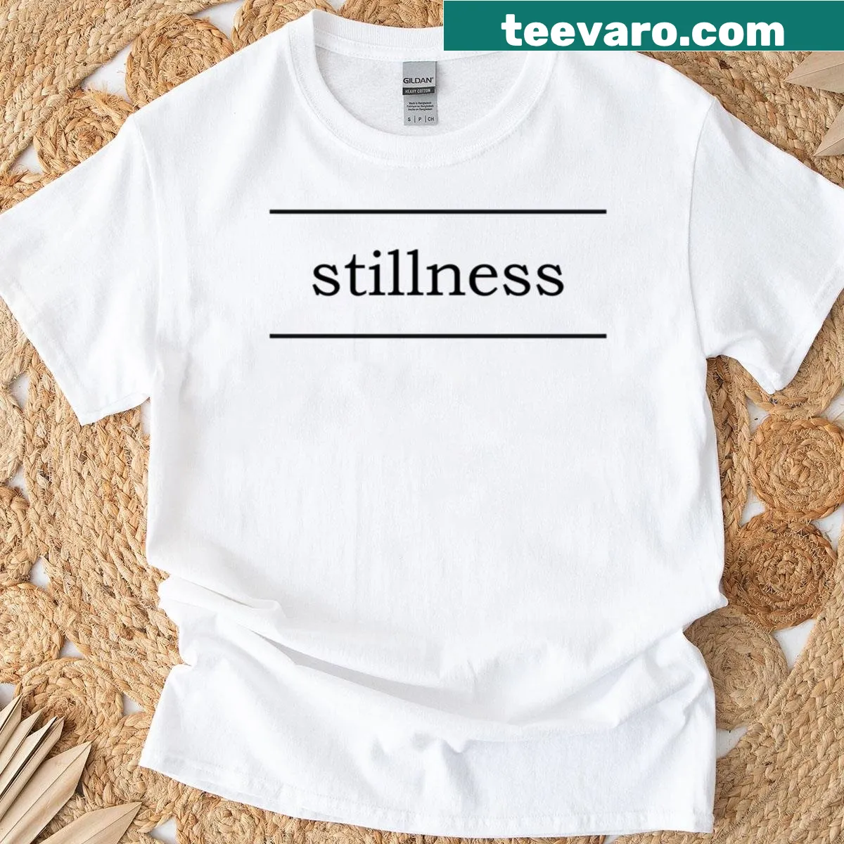 Minimalist t-shirt featuring the word 'Stillness' in clean typography — on a men's t-shirt
