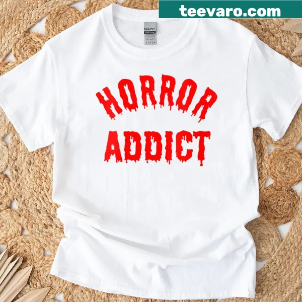 Horror-themed women's t-shirt with spooky graphics and typography