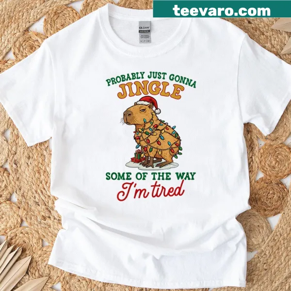 Humorous Christmas T-shirt featuring a festive capybara design
