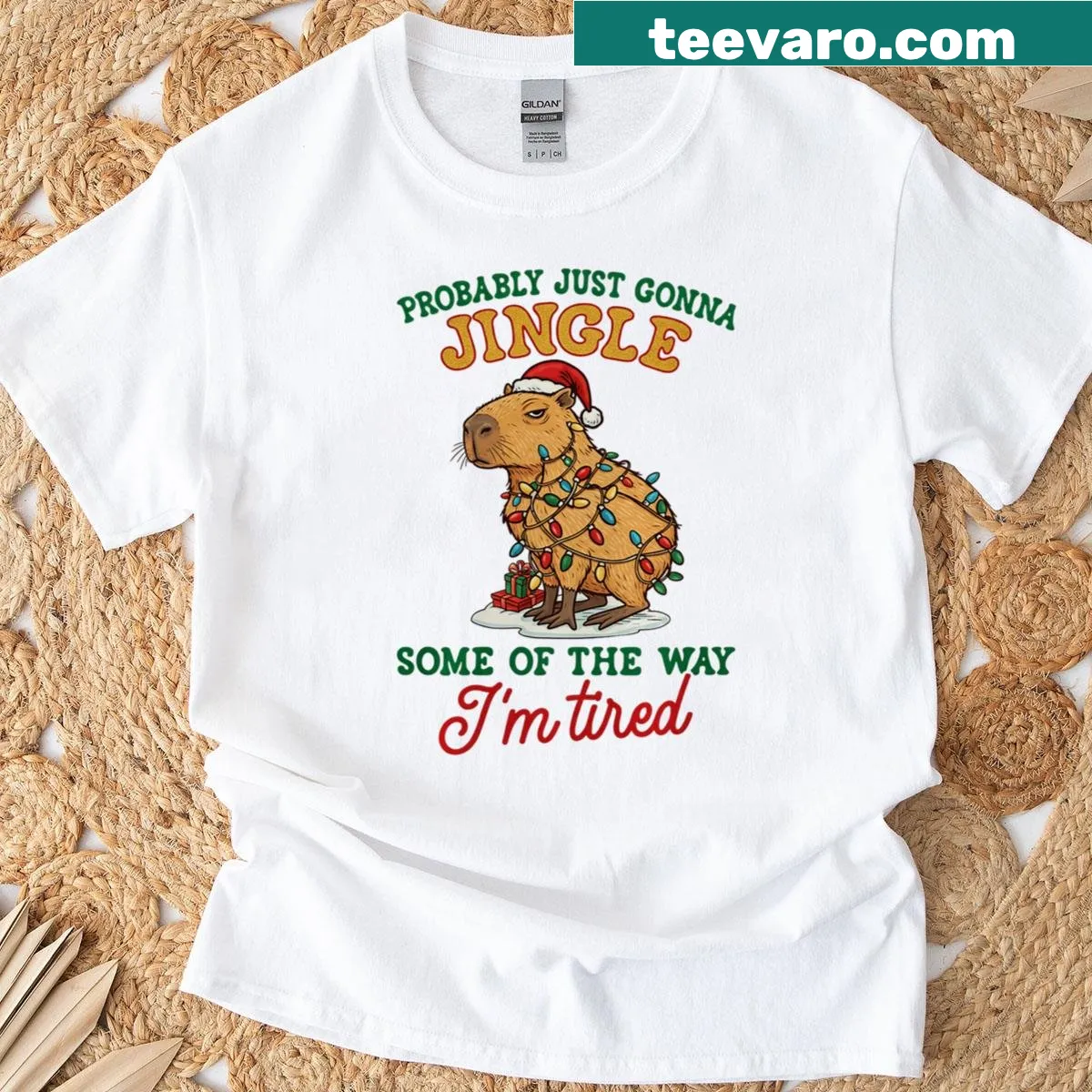 Humorous Christmas T-shirt featuring a festive capybara design — on a men's t-shirt