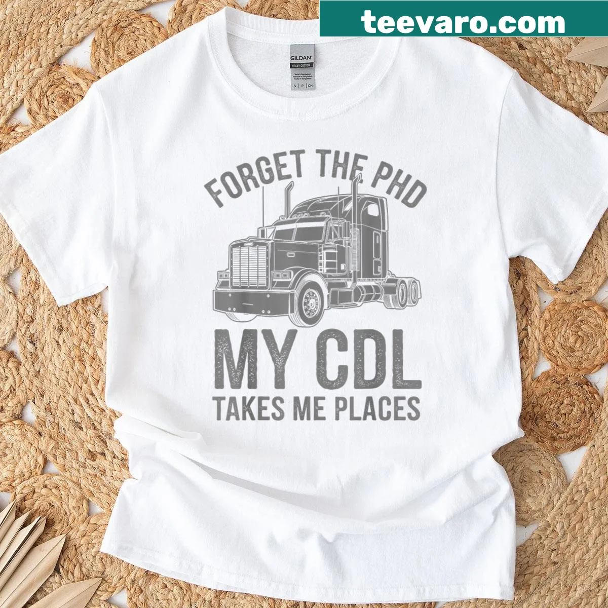 Trucker art t-shirt with badge design for CDL truck drivers — on a men's t-shirt