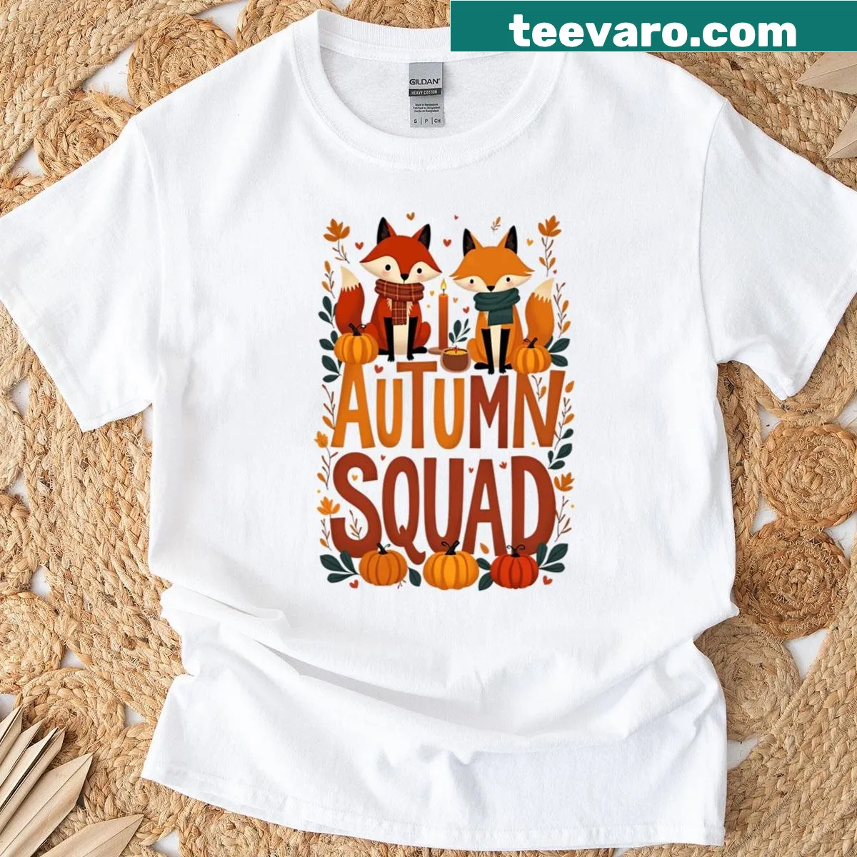 Illustration of cozy foxes and pumpkins on a fall-themed t-shirt — on a men's t-shirt