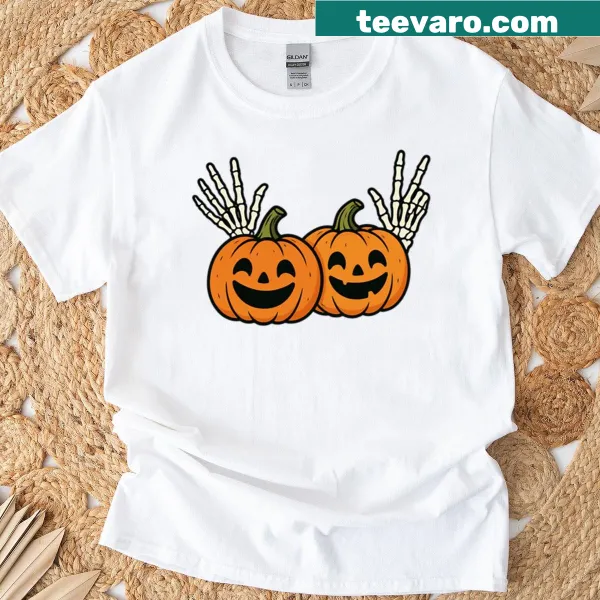 Oversized T-shirt with cute pumpkins and skeleton hands design