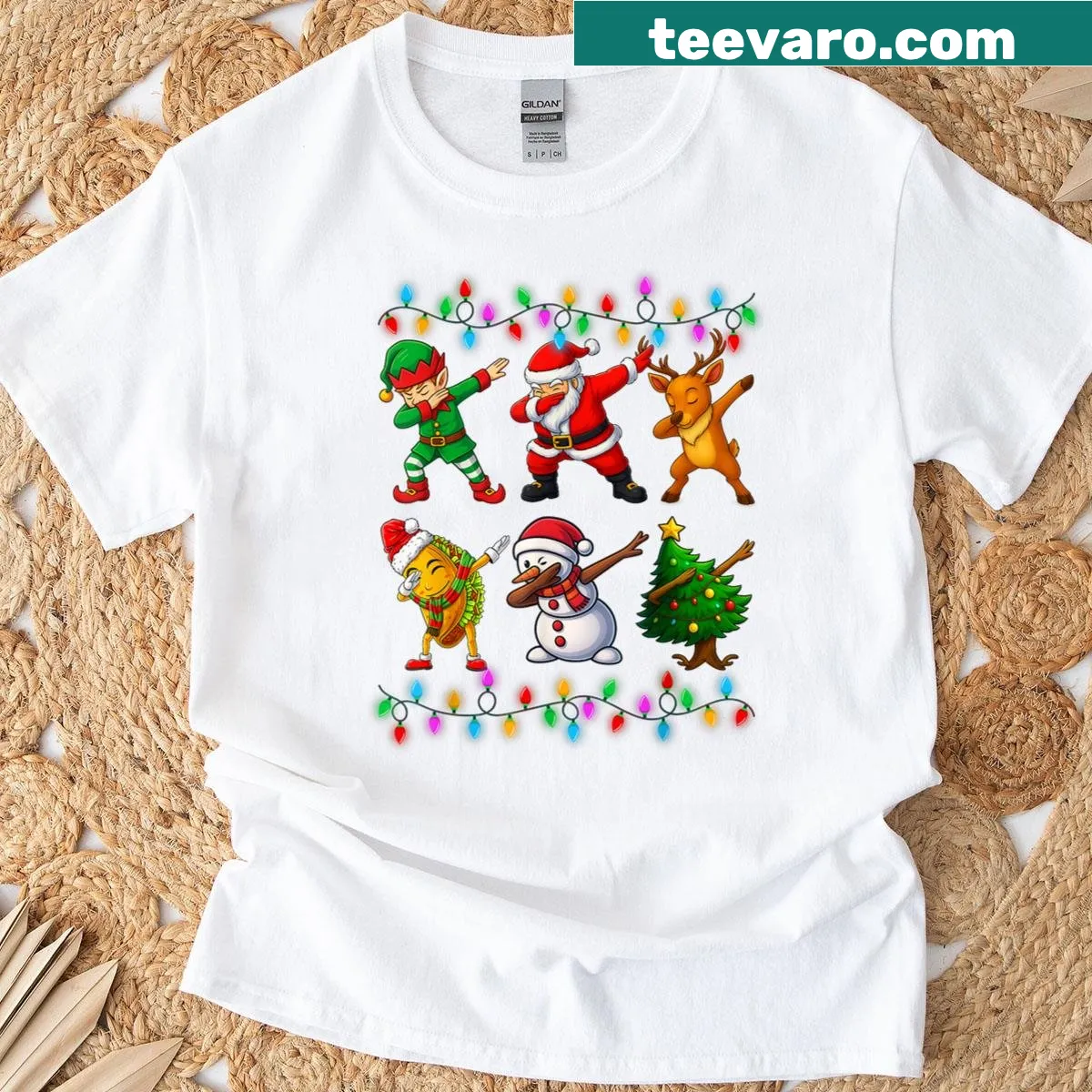 Funny Christmas T-shirt featuring a dabbing Santa elf design for kids — on a men's t-shirt