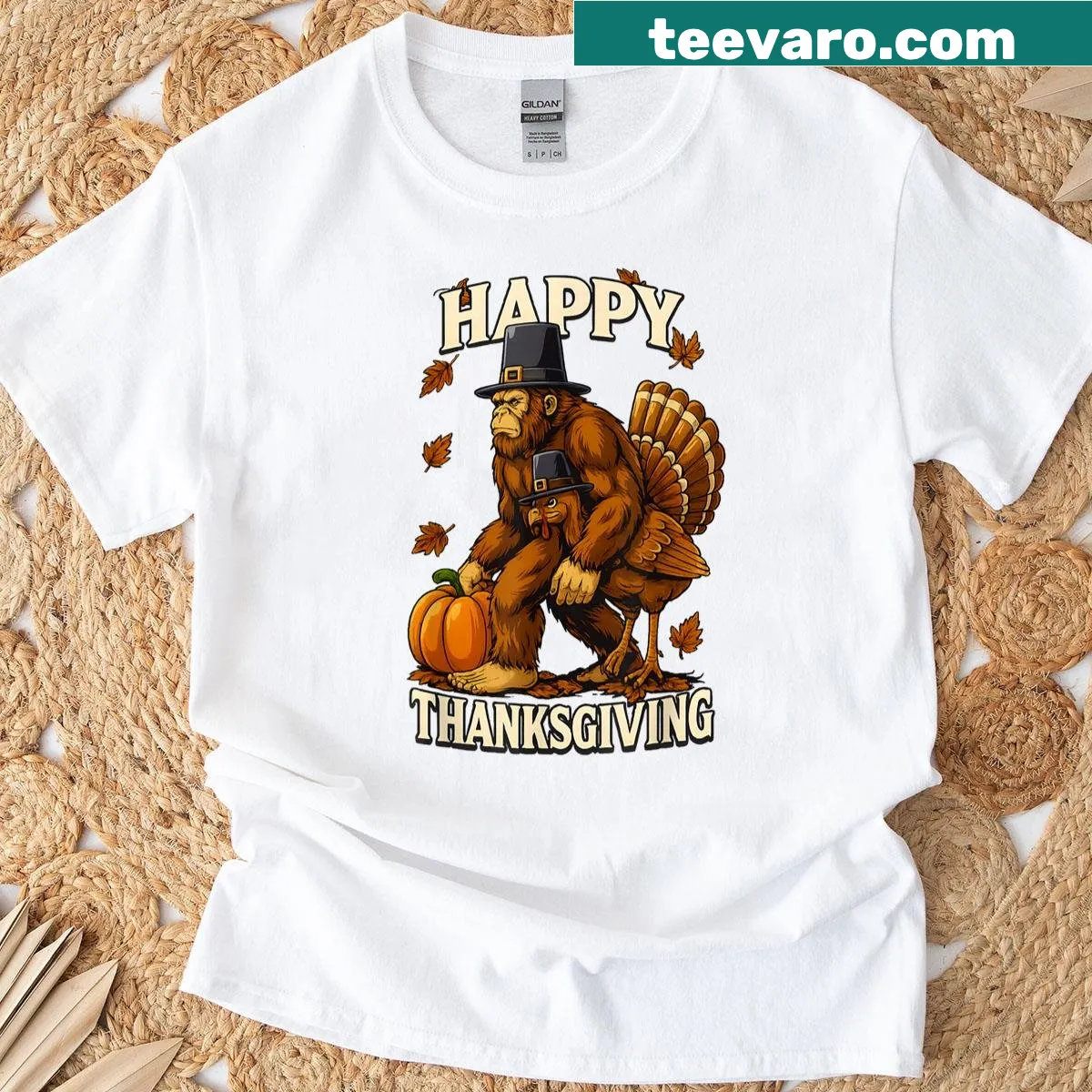 Cartoon Bigfoot pilgrim with turkey and pumpkin for Thanksgiving on t-shirt — on a men's t-shirt