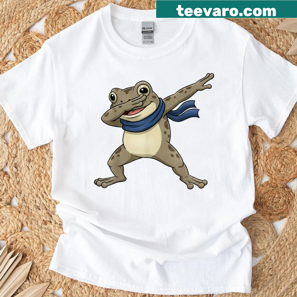 Cartoon frog dabbing design on a playful T-shirt — on a men's t-shirt