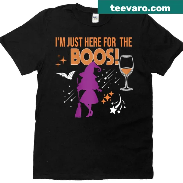Whimsical witch with 'I'm just here for the boos' text on a Halloween T-shirt