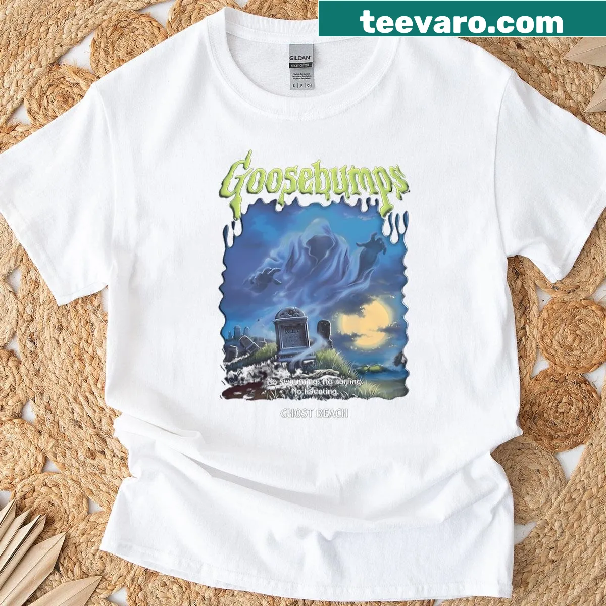 Playful ghost enjoying the beach graphic t-shirt — on a men's t-shirt