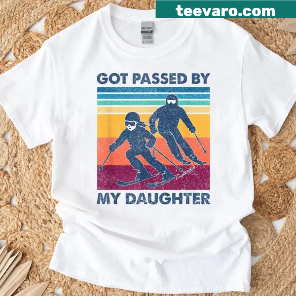 Funny skiing T-shirt with text about being passed by daughter