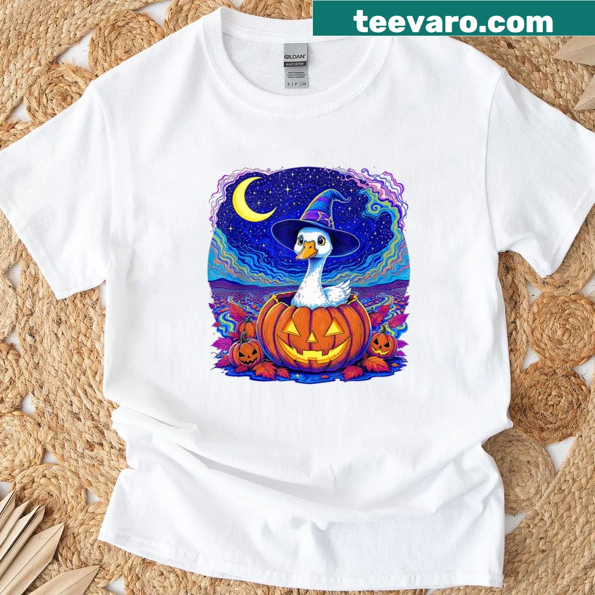 Funny goose inside a pumpkin wearing a witch hat for Halloween — on a men's t-shirt