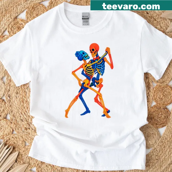 Whimsical Halloween-themed t-shirt with dancing characters
