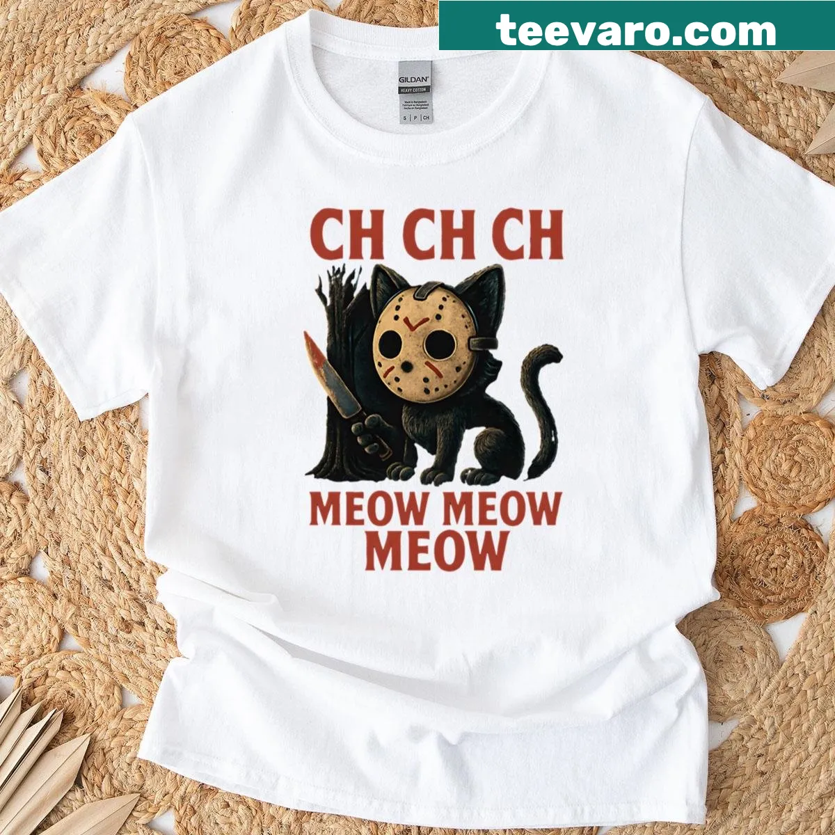 Cartoon cat in a mask with humorous horror-themed text on a T-shirt. — on a men's t-shirt