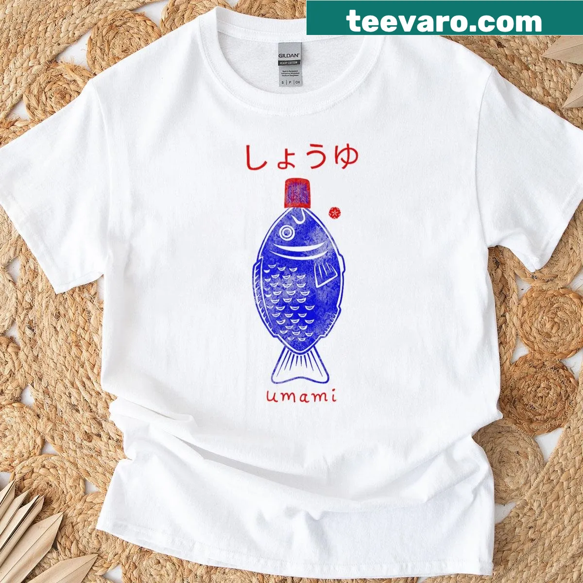 Graphic t-shirt featuring a playful fish design and soy sauce elements — on a men's t-shirt