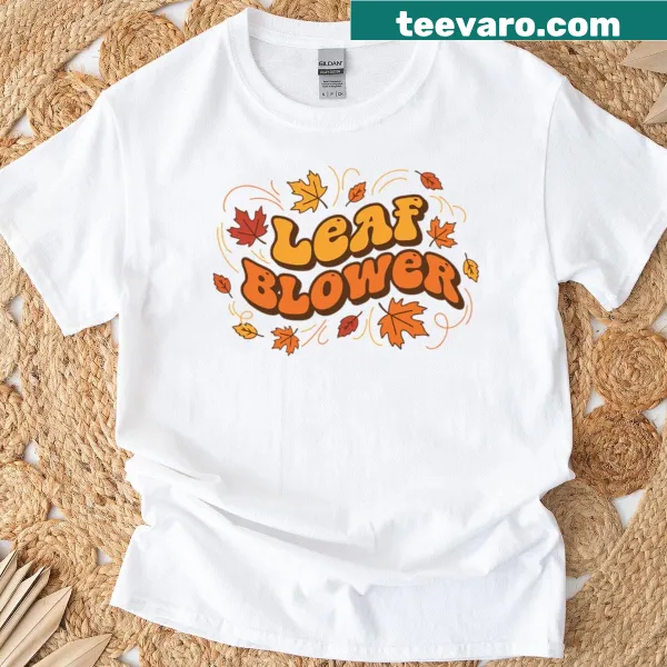 Funny autumn-themed t-shirt with a leaf blower graphic