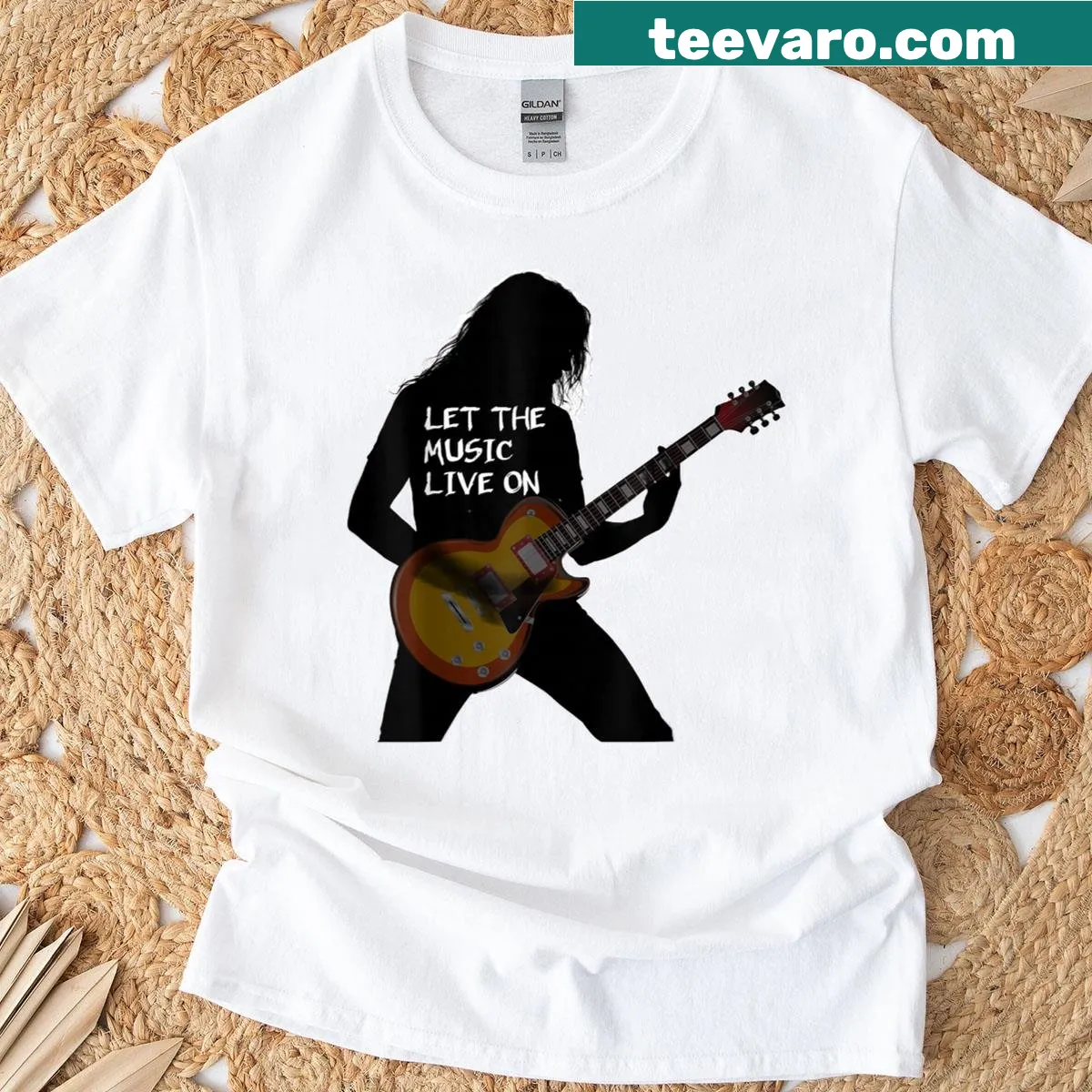 Illustrated design featuring guitar heroes and musical elements — on a men's t-shirt