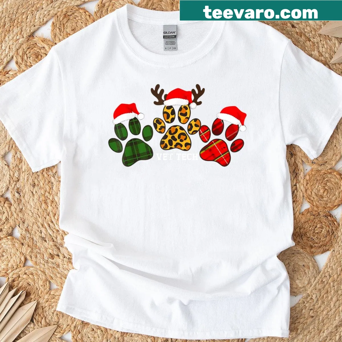 Christmas-themed Veterinary Technician T-shirt with dog paw graphic — on a men's t-shirt