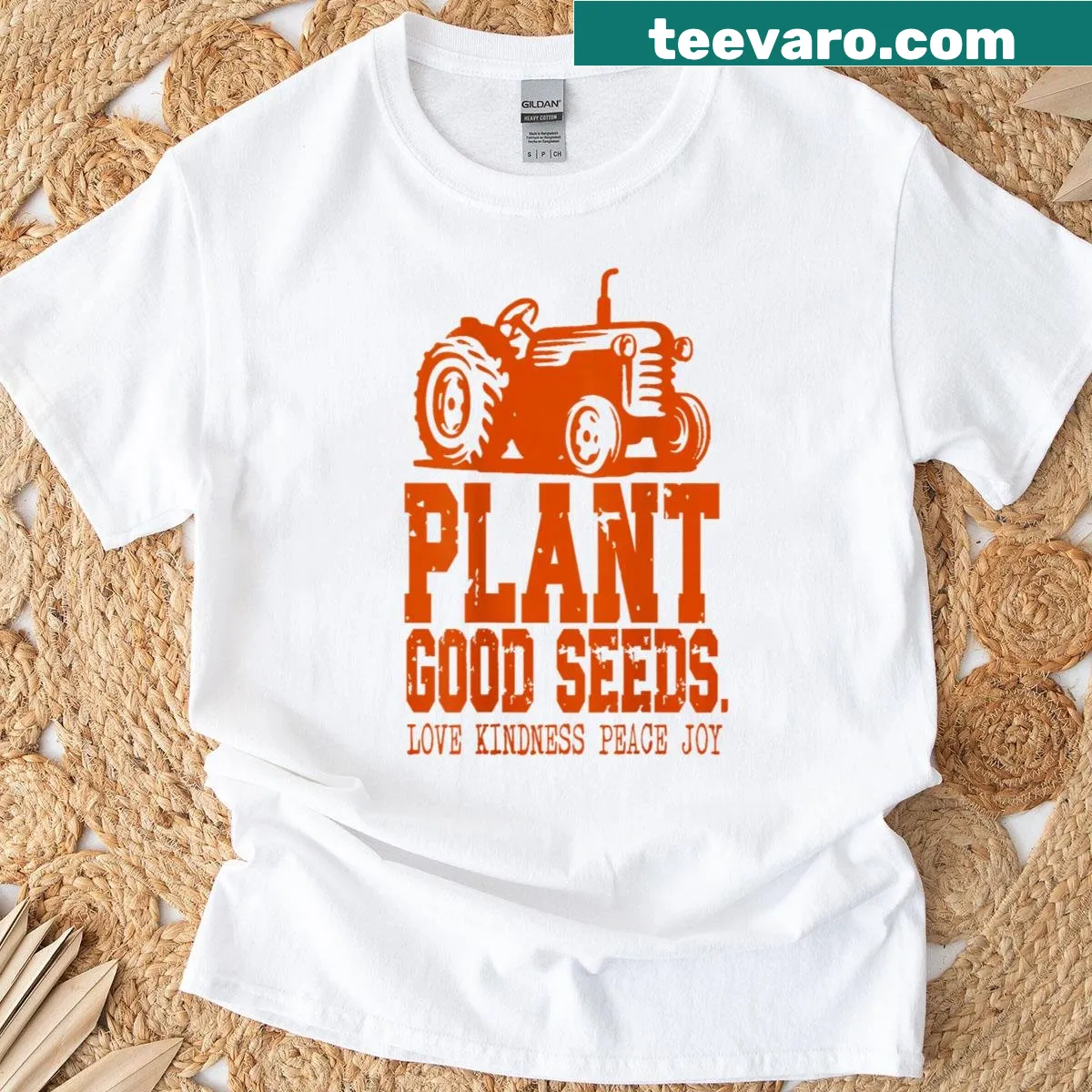 Vintage-style t-shirt with tractor and 'Plant Good Seeds' quote — on a men's t-shirt