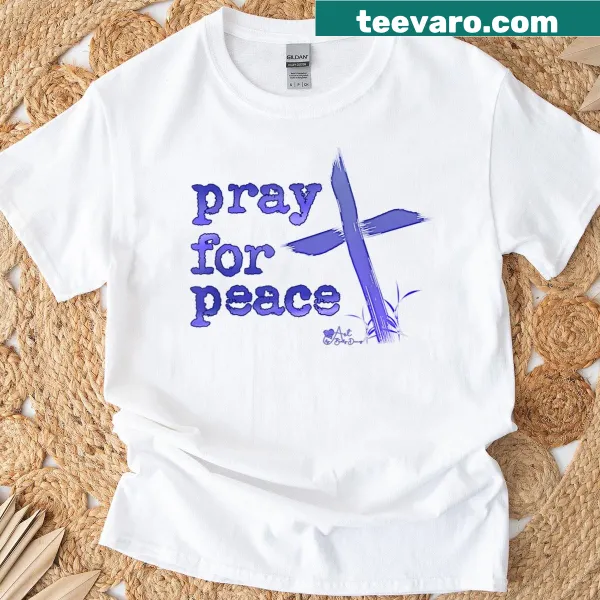 T-shirt with 'Pray For Peace' and cross graphic in vintage font