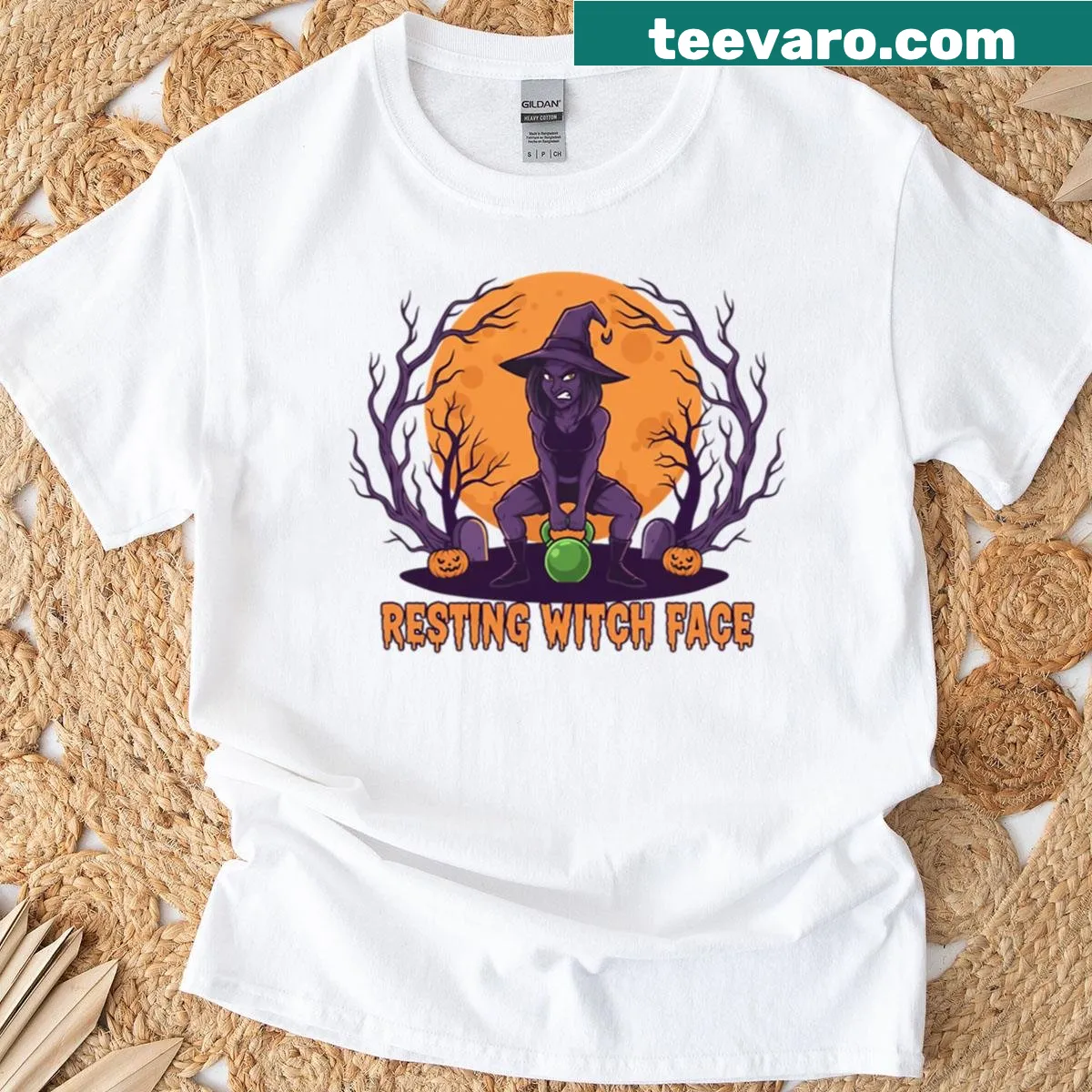 Cartoon witch with kettlebell on a humorous Halloween workout t-shirt — on a men's t-shirt