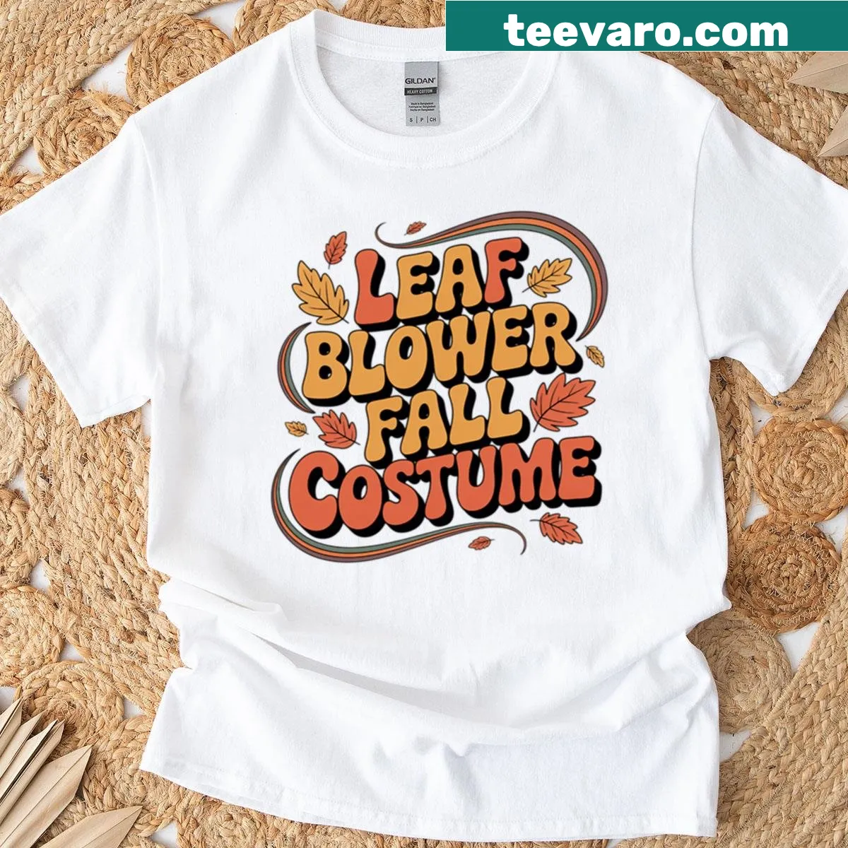 Oversized T-shirt with a retro leaf blower design celebrating fall. — on a men's t-shirt