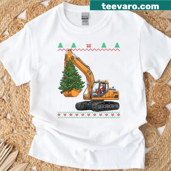 T-shirt featuring Santa driving an excavator with a Christmas tree.