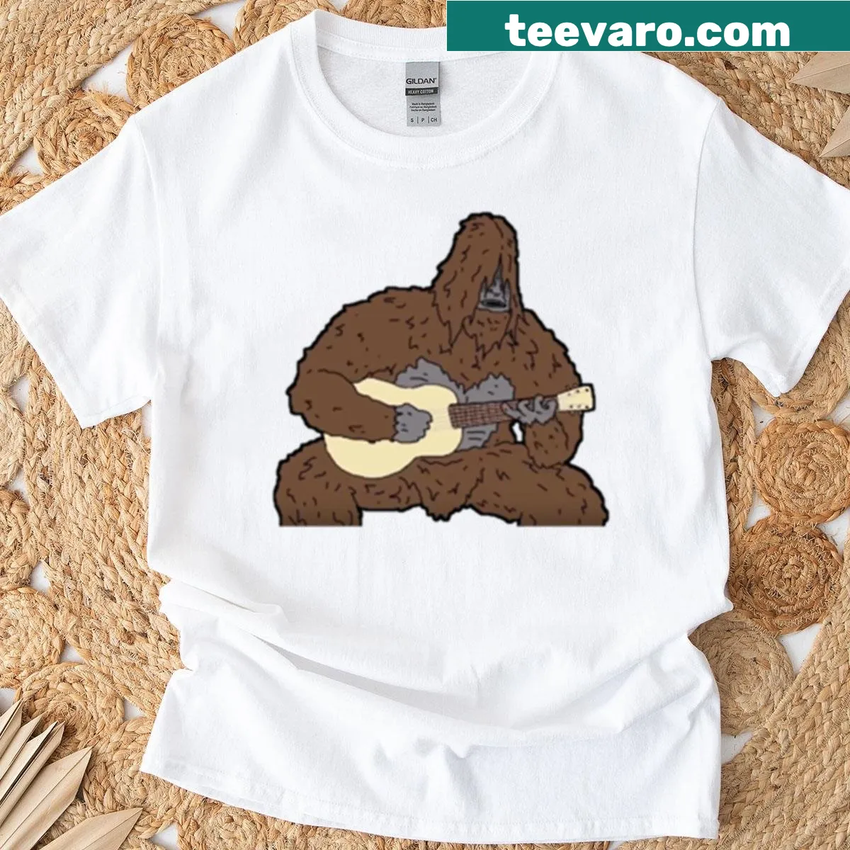 Illustrated sassy character playing guitar on t-shirt — on a men's t-shirt