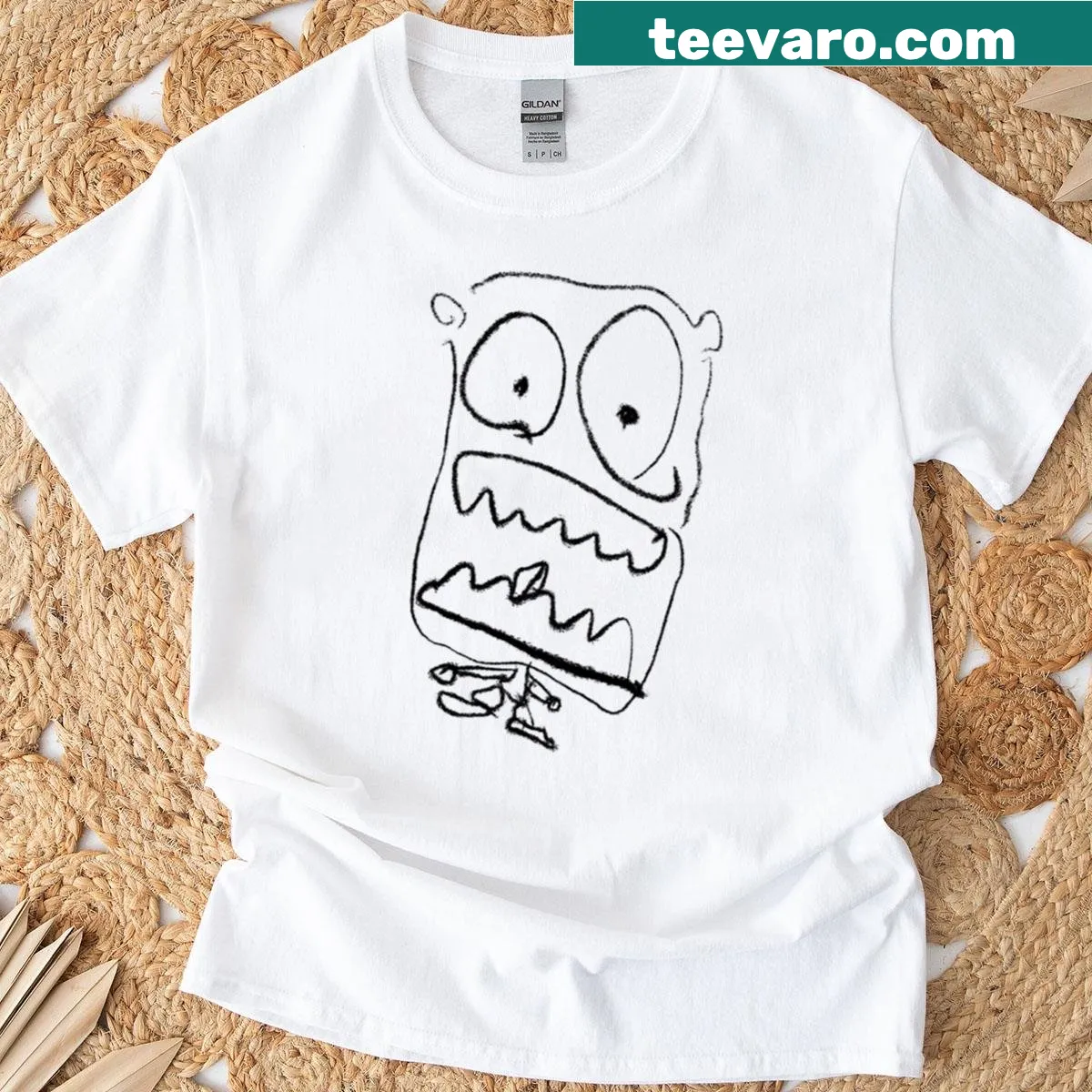Goofy monster sketch graphic on oversized T-shirt — on a men's t-shirt