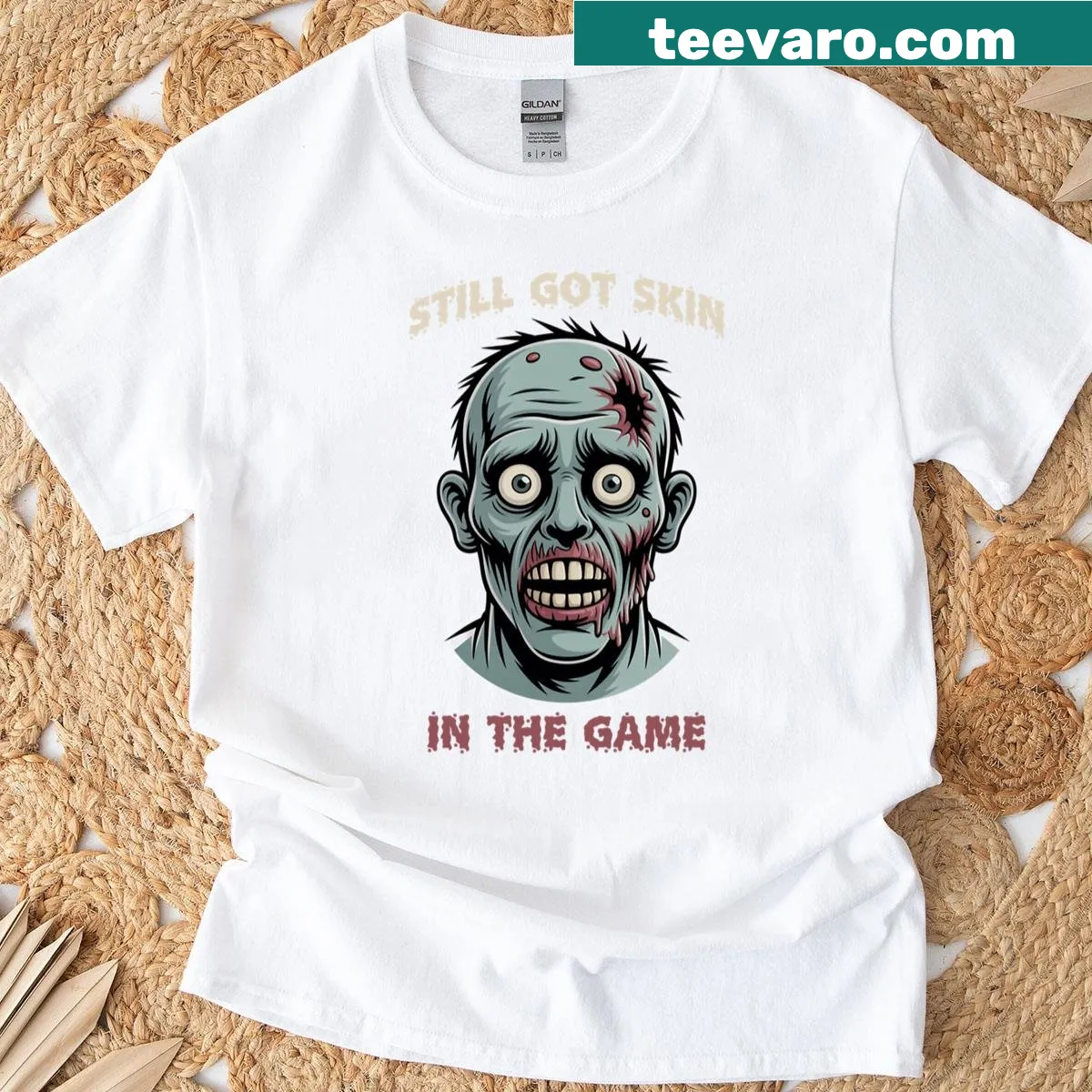 Funny horror T-shirt with 'Still Got Skin' text — on a men's t-shirt