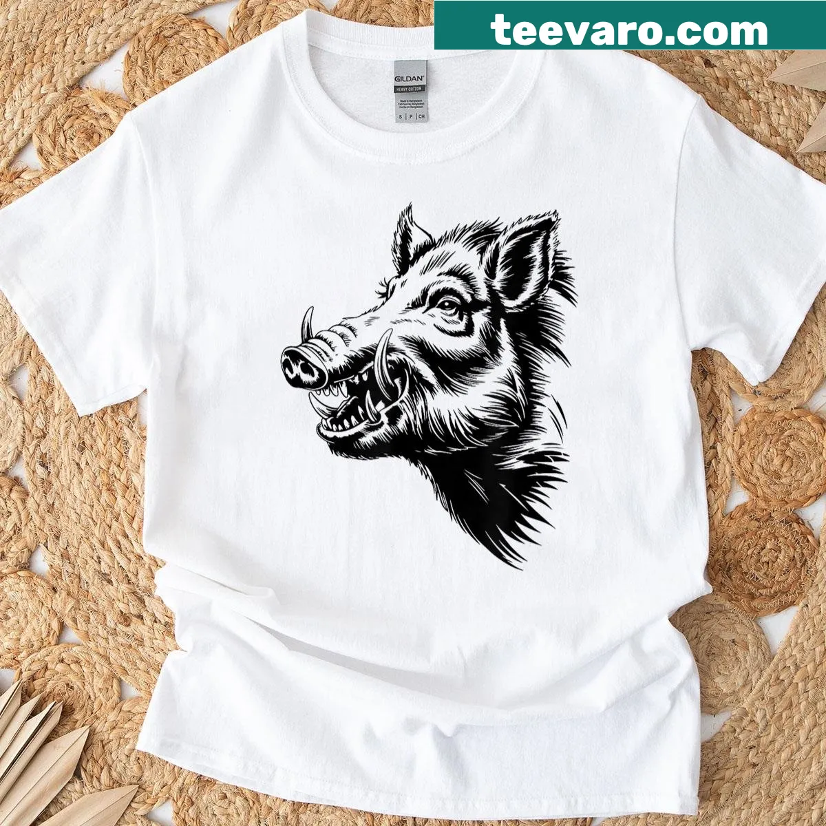 T-shirt featuring a graphic of a wild boar — on a men's t-shirt