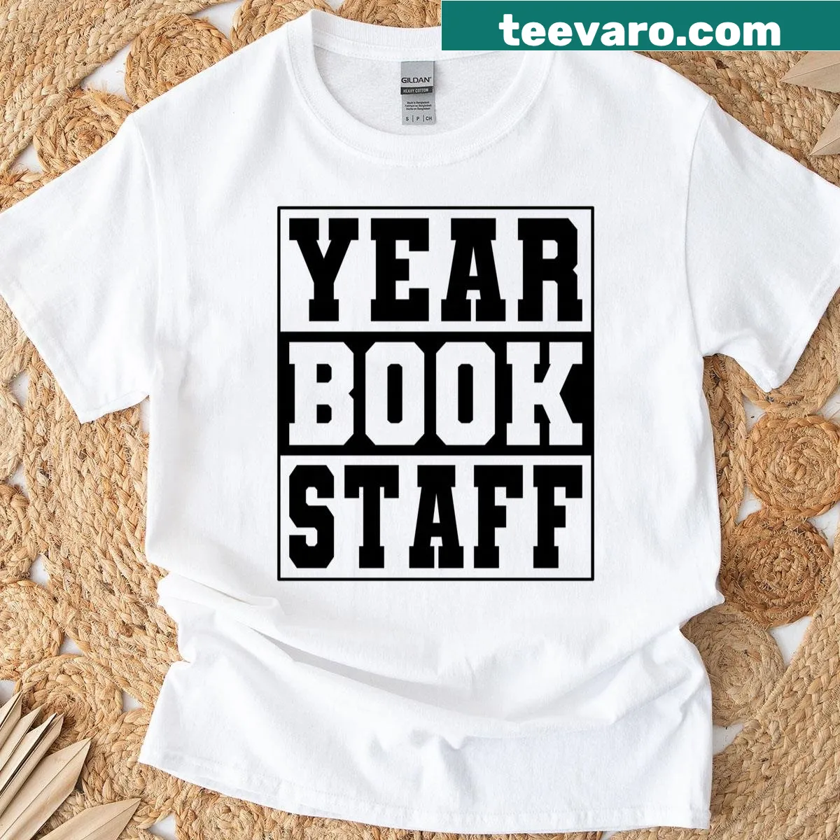 Yearbook Staff black text graphic T-shirt — on a men's t-shirt