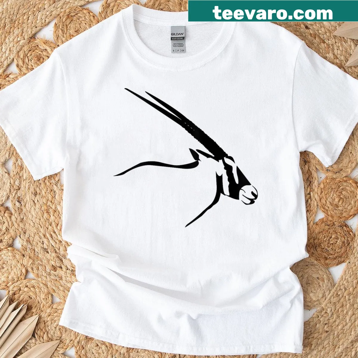 T-shirt depicting an Arabian Oryx antelope graphic — on a men's t-shirt