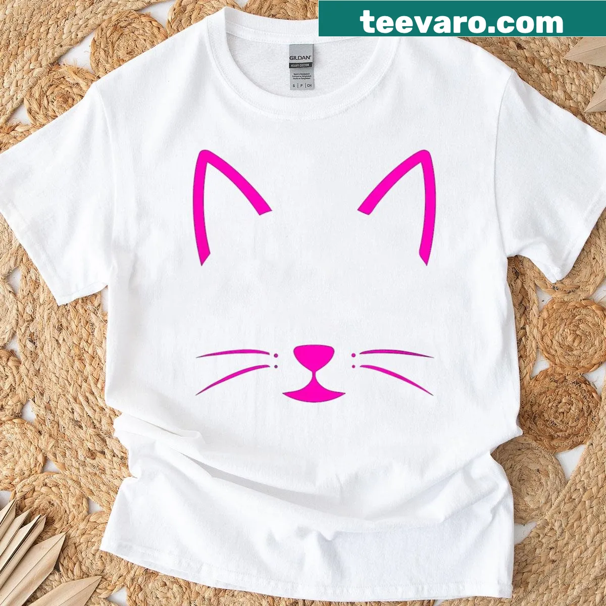 Minimalist cat or kitten face design on a stylish T-shirt — on a men's t-shirt